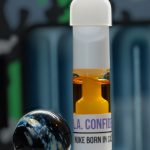 1080mg LA Confidential Nuke Cartridge with Afghani and California Indica lineage, earthy pine, kush gas, and sedating effects