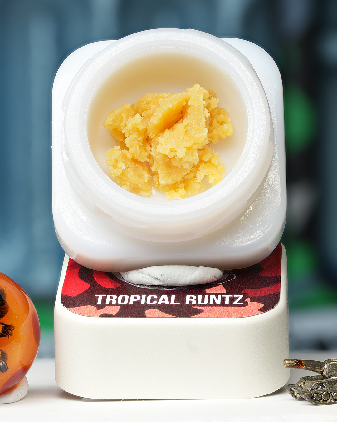 Tropical Runtz BHO caviar jar with pale golden textured concentrate in Dank Tank studio photography