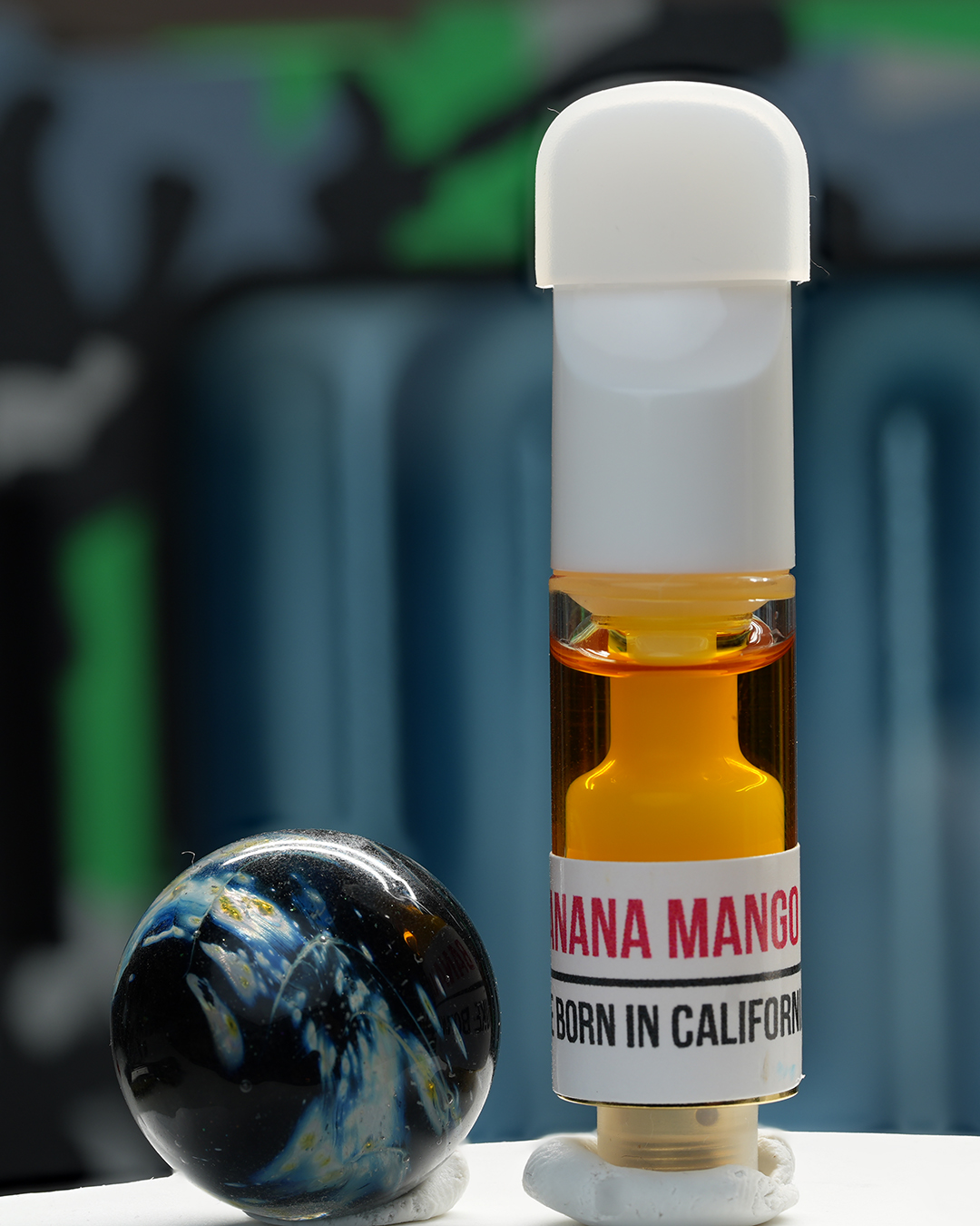 1080mg Banana Mango Nuke Cartridge with Banana Kush and Mango Pie lineage, banana cream, ripe mango, tropical fruit, and energizing effects