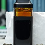 2000mg Apple Fritter Nuke All-in-One vape with Apples and Bananas and Melted Strawberry lineage, fruit pastry flavor, and daytime effects