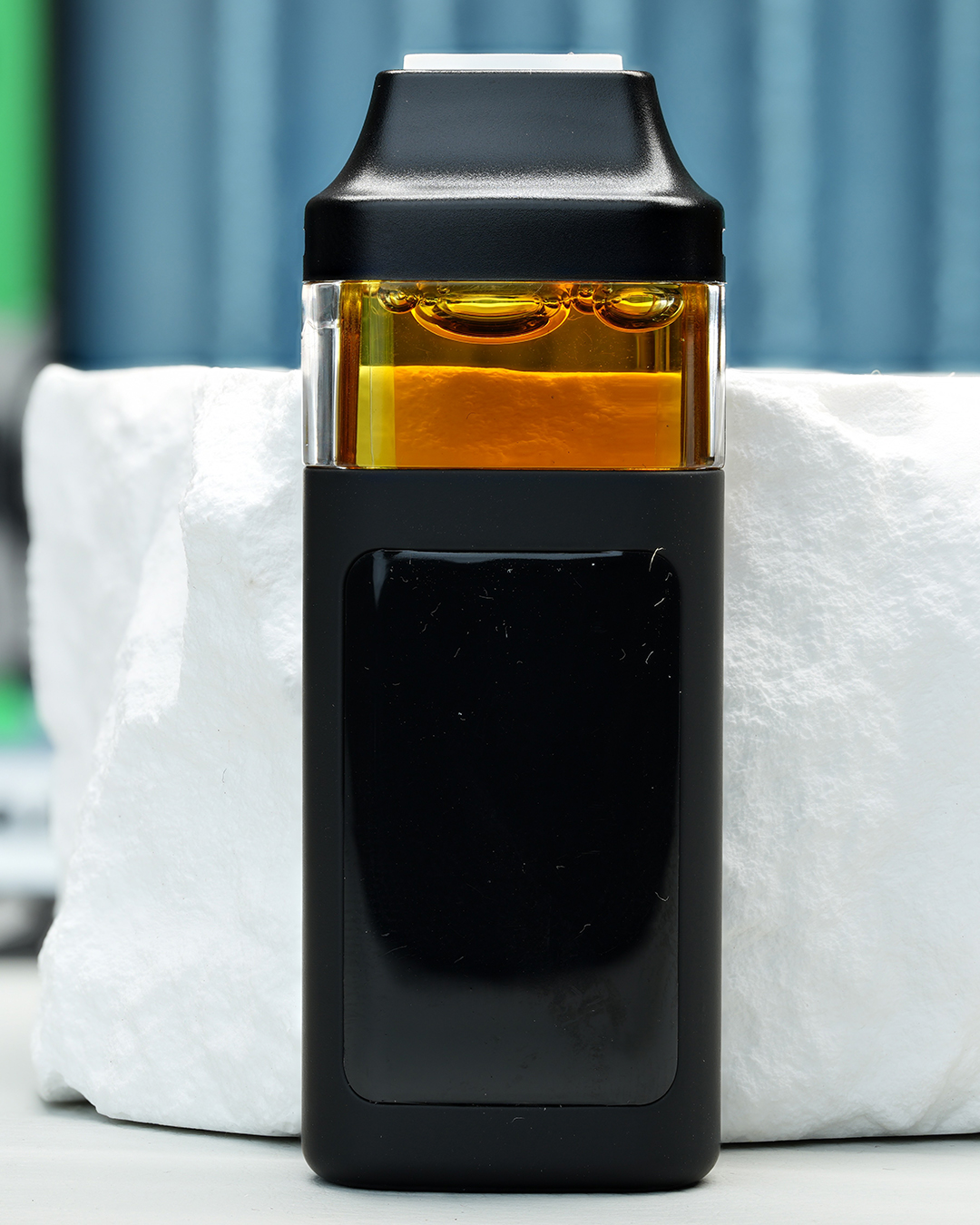 2000mg GMO Nuke All-in-One vape with savory garlic gas, funky diesel, earthy spice, heavy kush, and sedating effects