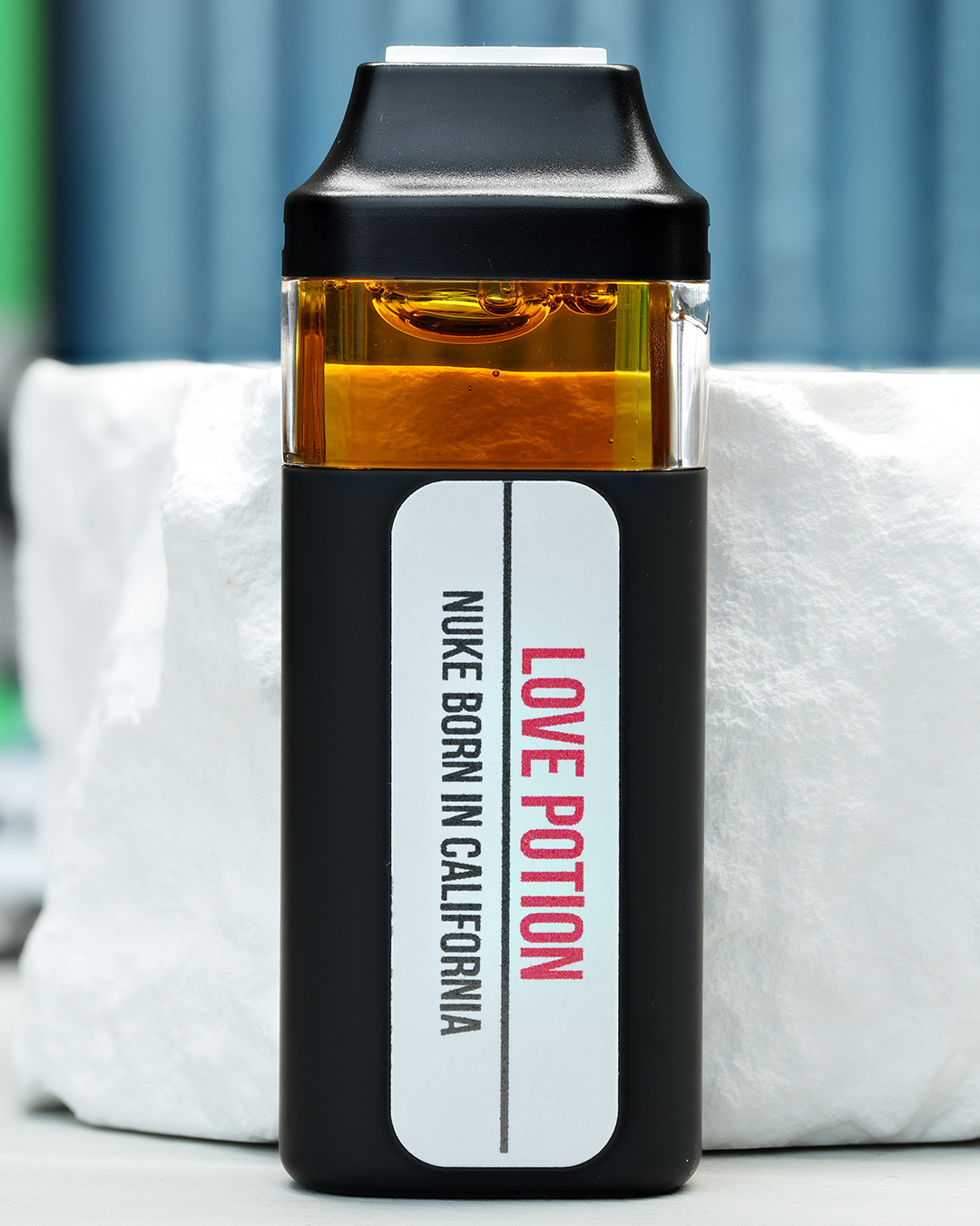 2000mg Love Potion Nuke All-in-One vape with sweet citrus, berry haze, gassy diesel, and energizing effects
