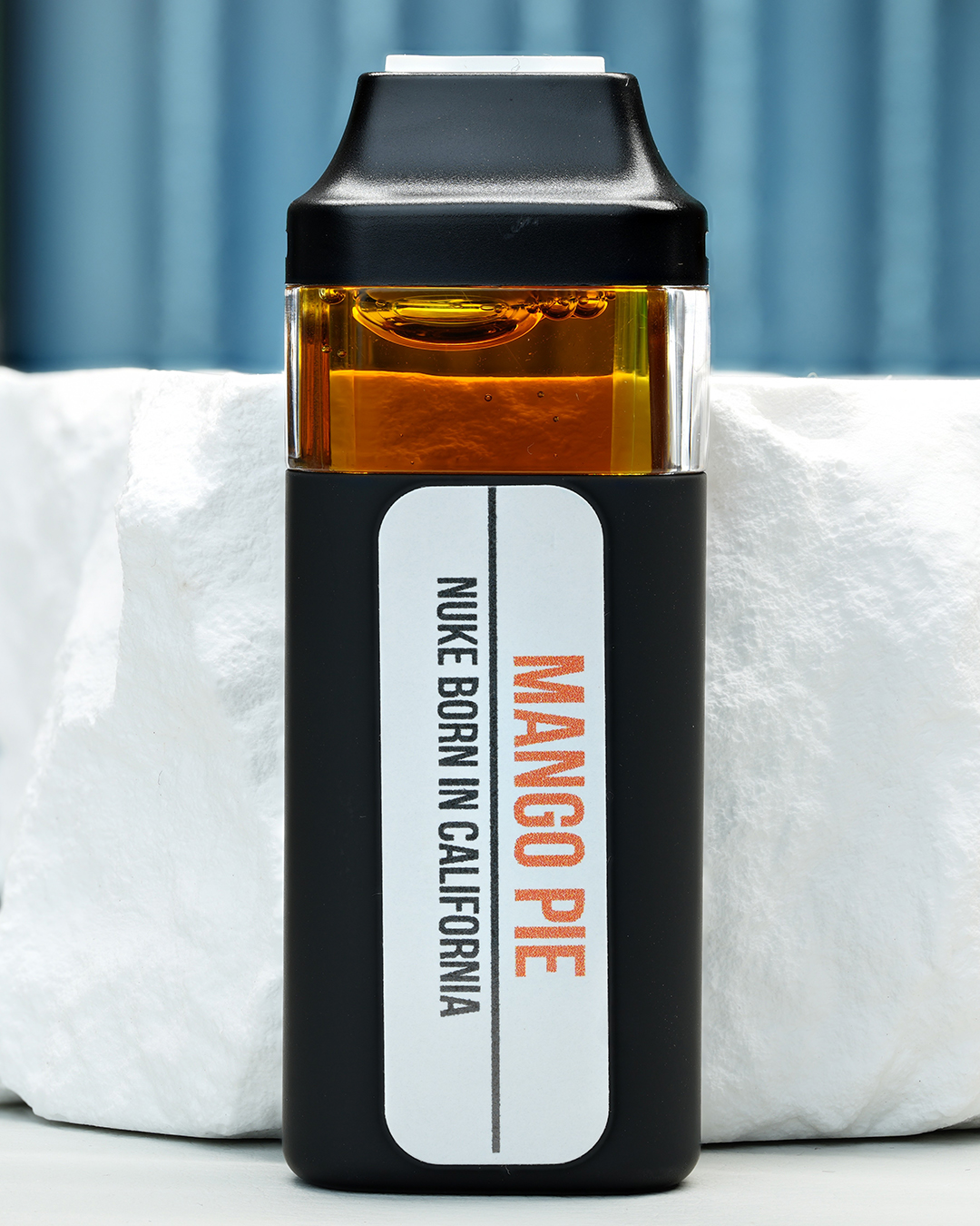 2000mg Mango Pie Nuke All-in-One vape with Mango Kush and Ultraviolet lineage, ripe mango, tropical gas, citrus sweetness, and daytime effects