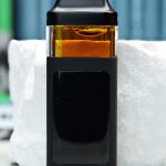2000mg Mango Pie Nuke All-in-One vape with Mango Kush and Ultraviolet lineage, ripe mango, tropical gas, citrus sweetness, and daytime effects