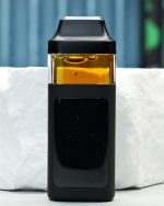 2000mg Maui Wowie Nuke All-in-One vape with pineapple, tropical citrus, mango, and sweet herbal terpenes