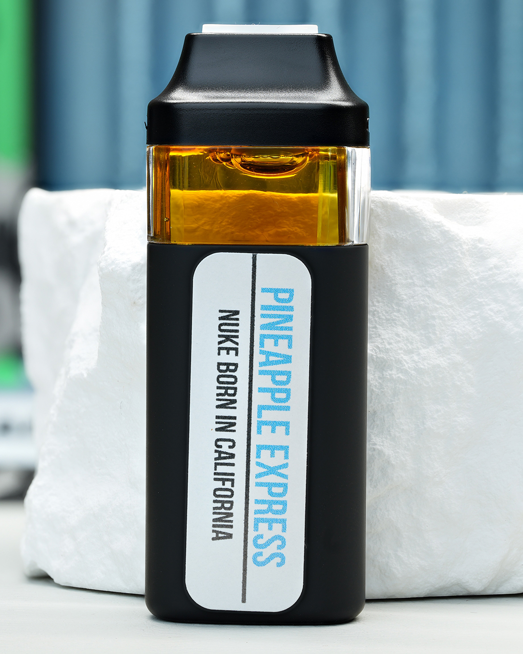 2000mg Pineapple Express Nuke All-in-One vape with juicy pineapple, tangy citrus, woody spice, and anytime effects