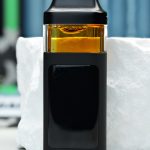 2000mg Pineapple Express Nuke All-in-One vape with juicy pineapple, tangy citrus, woody spice, and anytime effects