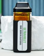 2000mg Ultraviolet Nuke All-in-One vape with grape candy, floral citrus, sweet berries, creamy kush, and mellowing effects
