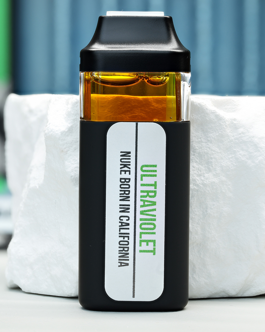 2000mg Ultraviolet Nuke All-in-One vape with grape candy, floral citrus, sweet berries, creamy kush, and mellowing effects