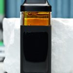 2000mg Ultraviolet Nuke All-in-One vape with grape candy, floral citrus, sweet berries, creamy kush, and mellowing effects