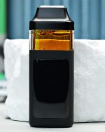2000mg Ultraviolet Nuke All-in-One vape with grape candy, floral citrus, sweet berries, creamy kush, and mellowing effects